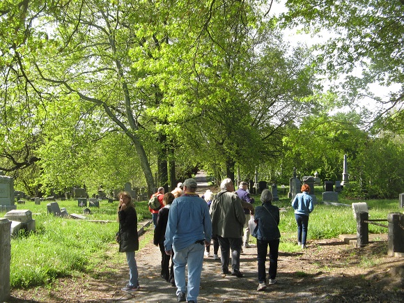 Attendees enjoy All Faiths Cemetery tour